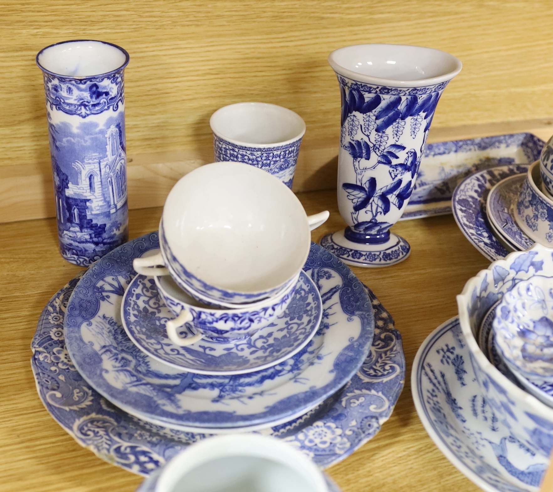 A collection of Chinese and Japanese blue and white jars, export plates and pots, together with European blue and white mixed tea wares